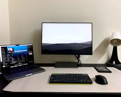 A neat desk setup displaying contact information context